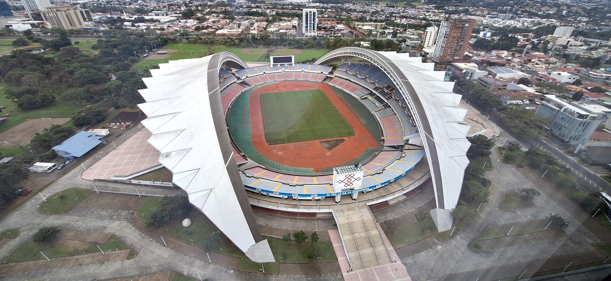 a stadium with a large roof