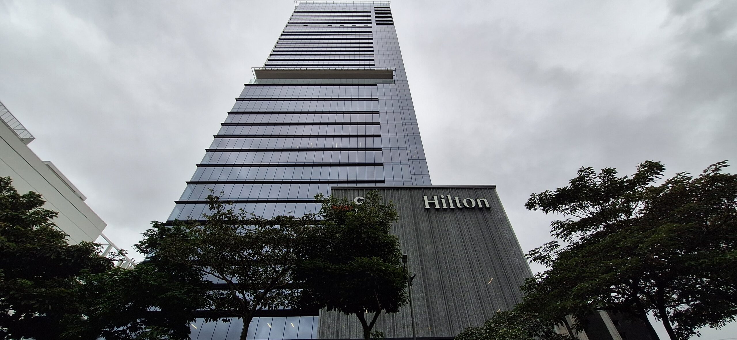 a tall building with a sign on it