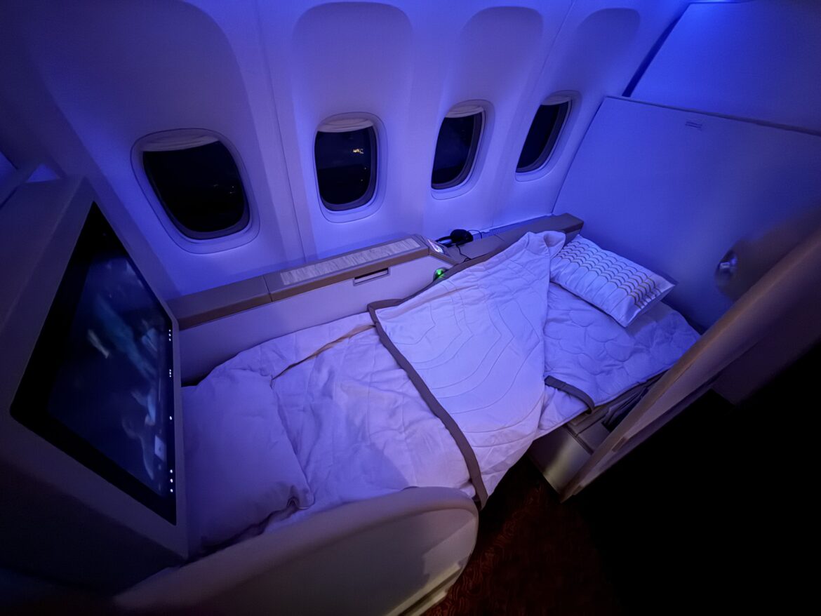 a bed in a plane