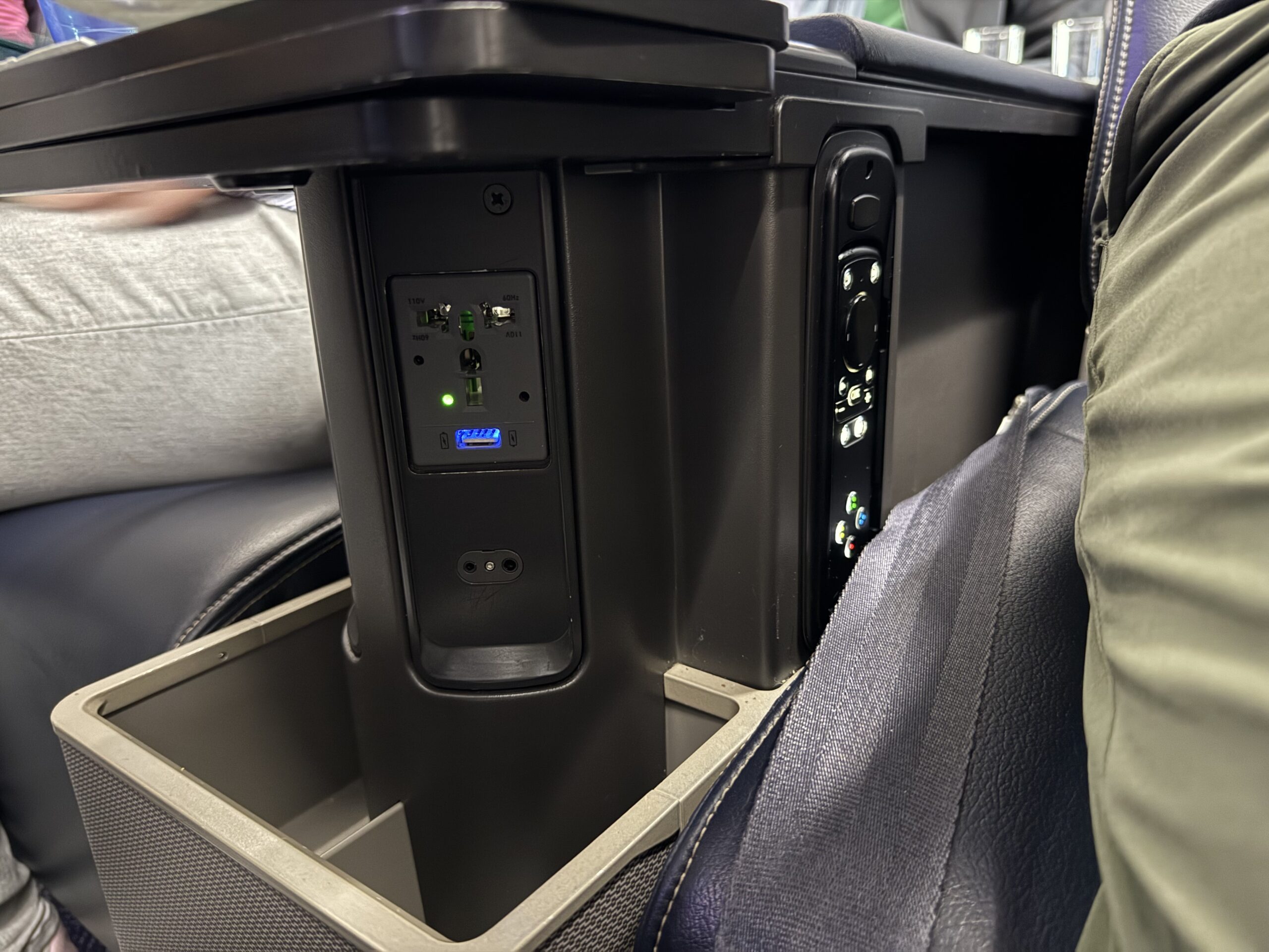 United First 737 Max a black rectangular object with buttons and a black cover