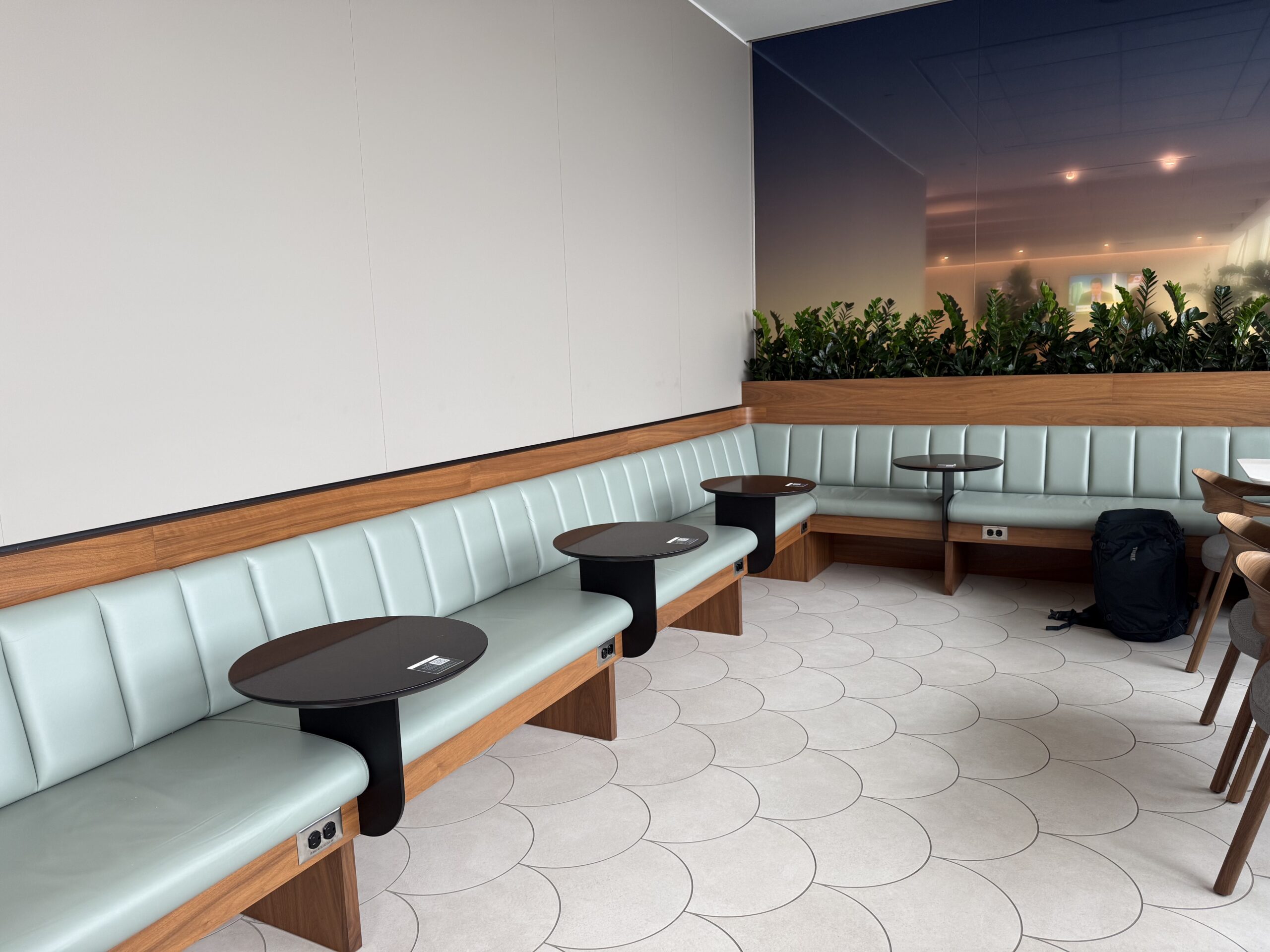 a person sitting in a booth