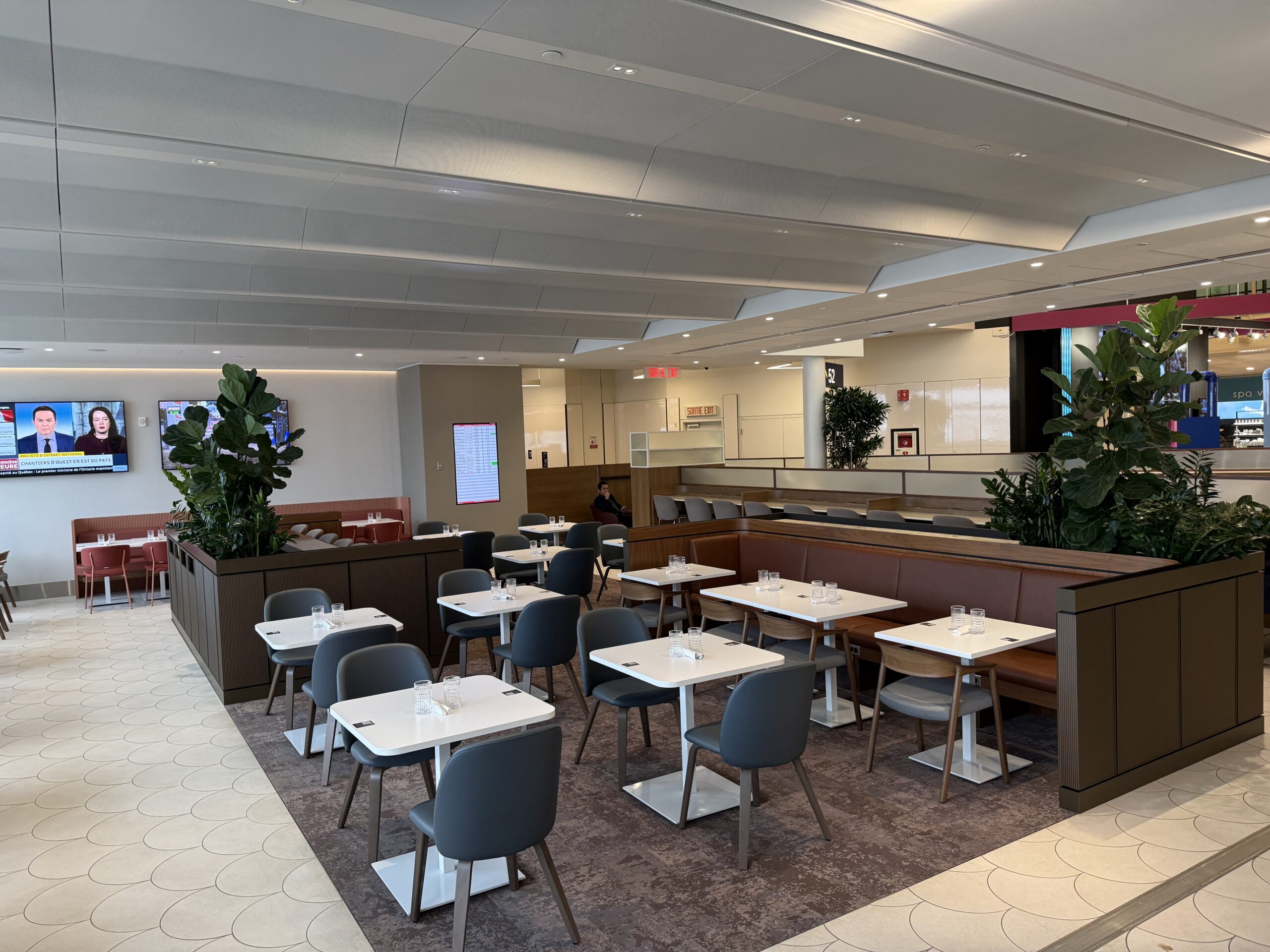 a restaurant with tables and chairs