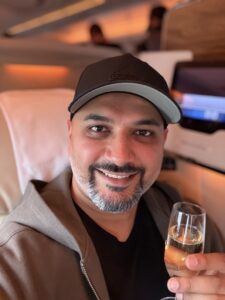 a man holding a glass of champagne