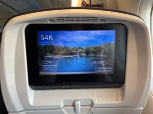 a screen on the back of an airplane