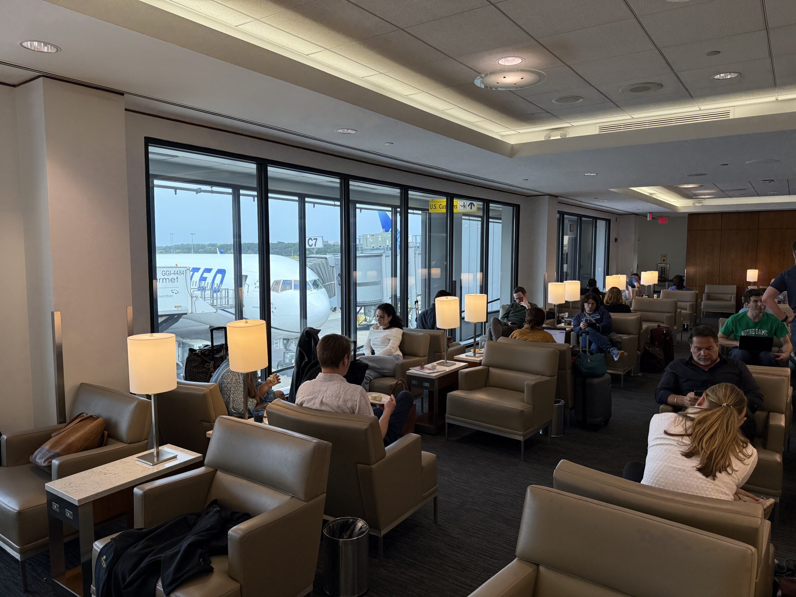 a group of people sitting in a lounge