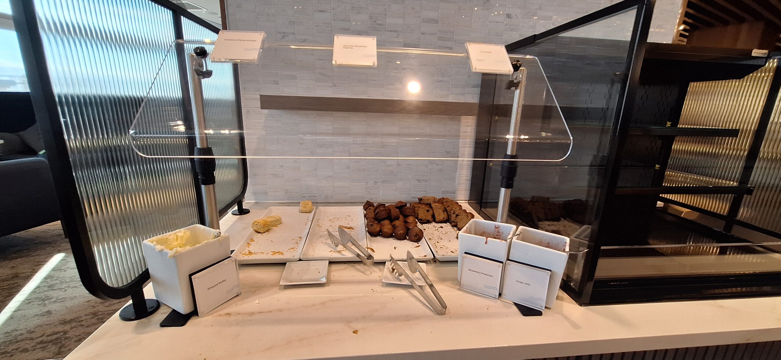 Centurion Lounge Las Vegas a counter with food on it