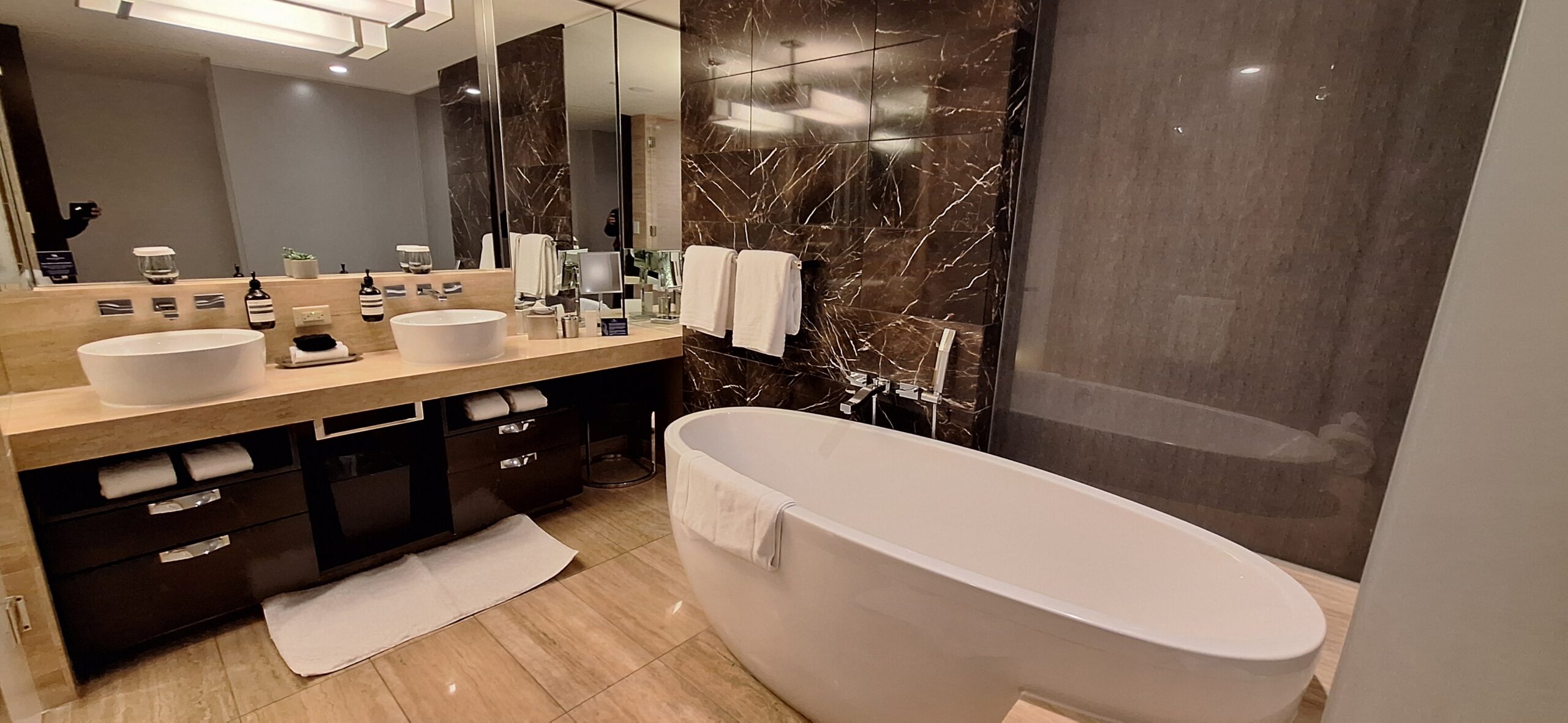 a bathroom with a tub and sink