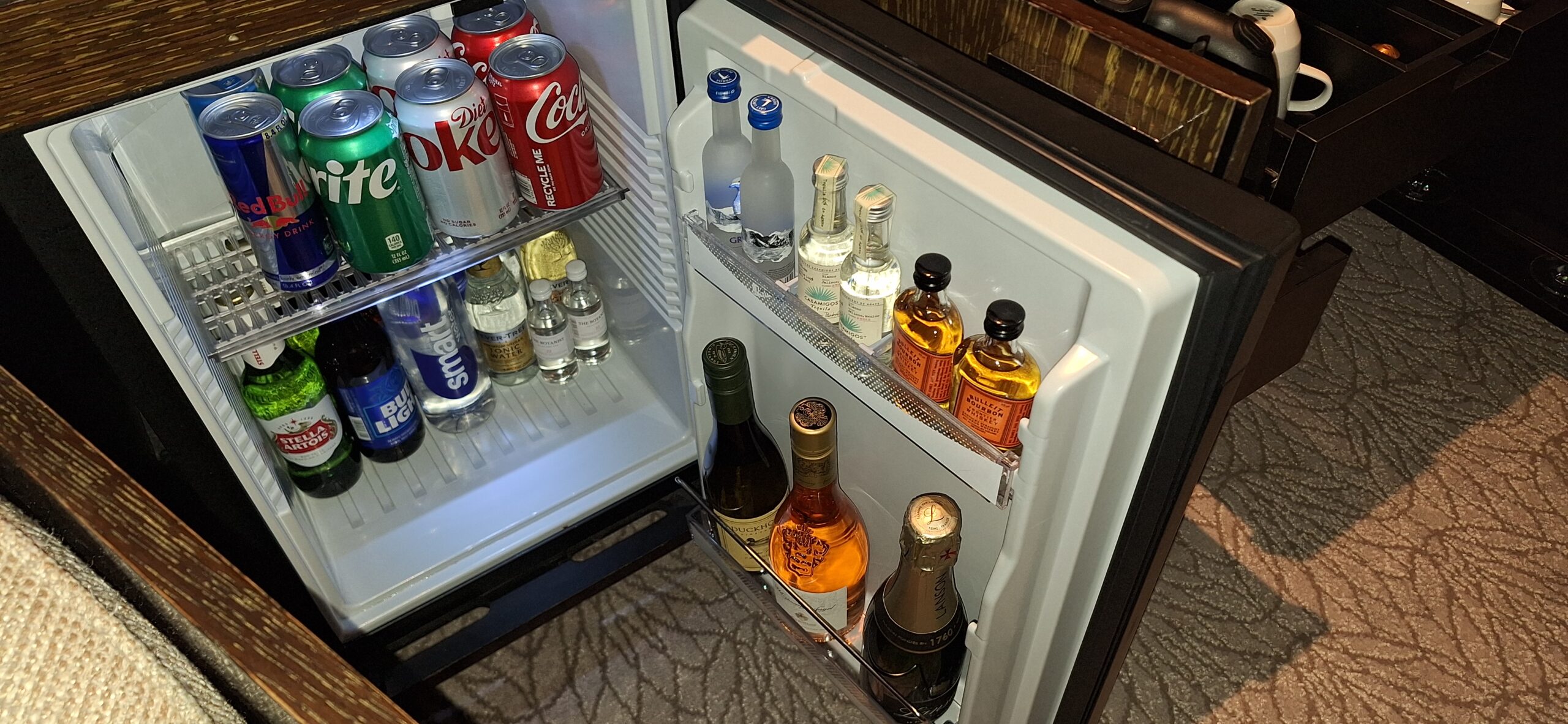 a mini fridge full of drinks