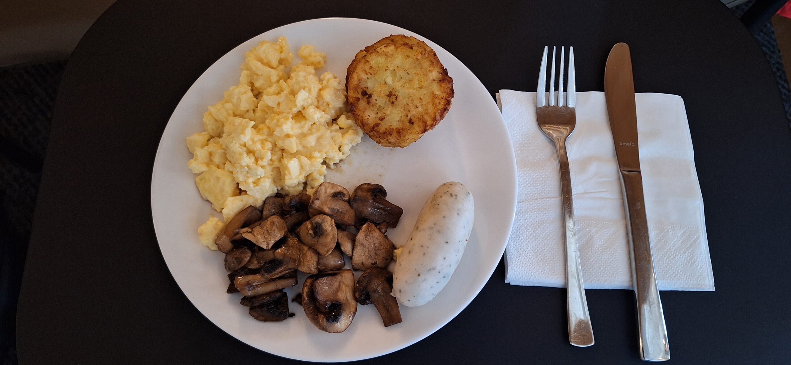 a plate of food with a fork and knife