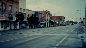 a street with buildings and cars on it