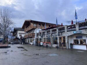 a building with flags on the side