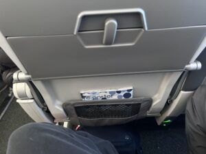 a seat with a pocket in the back