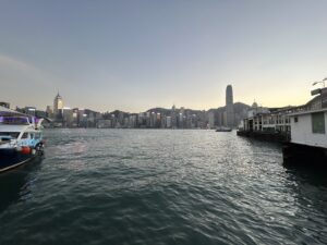 a body of water with buildings in the background