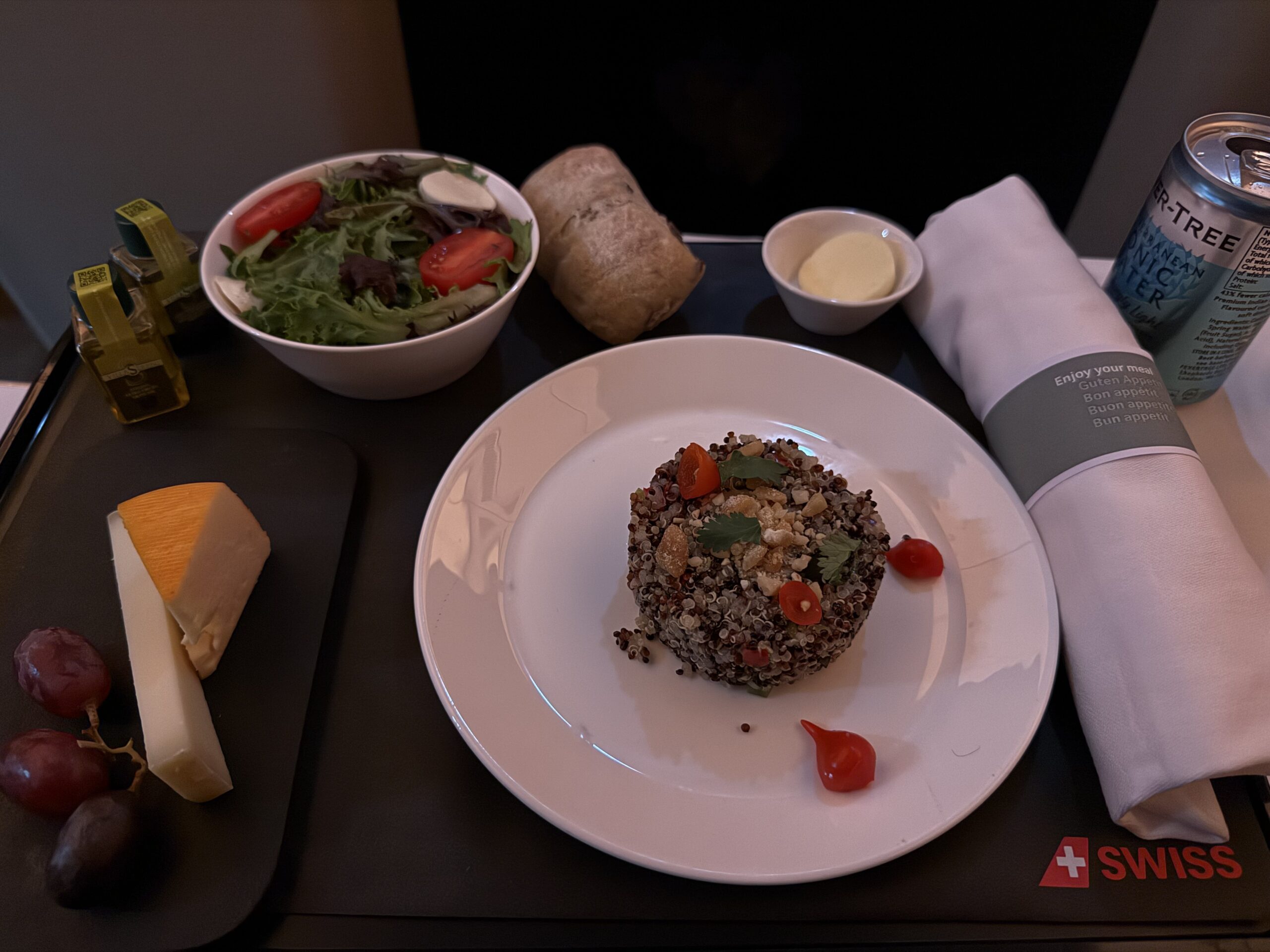 Swiss Business Class A330 a plate of food on a table