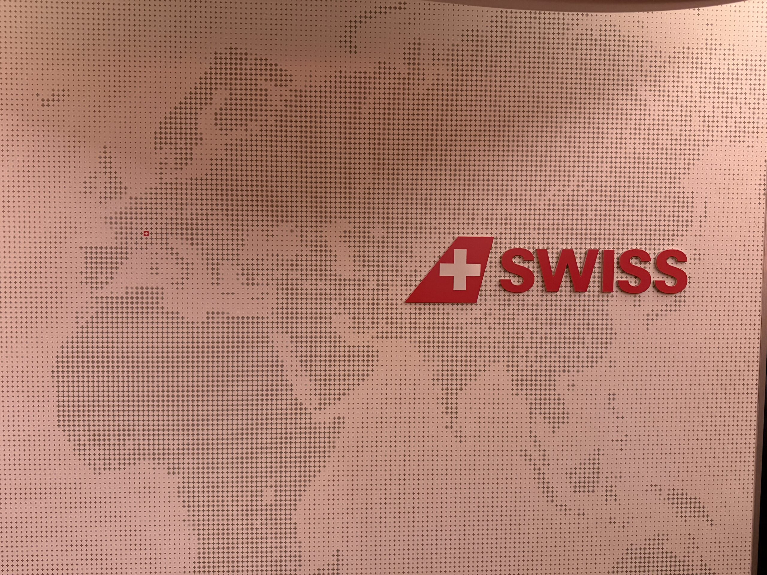 Swiss Business Class A330 a close up of a logo