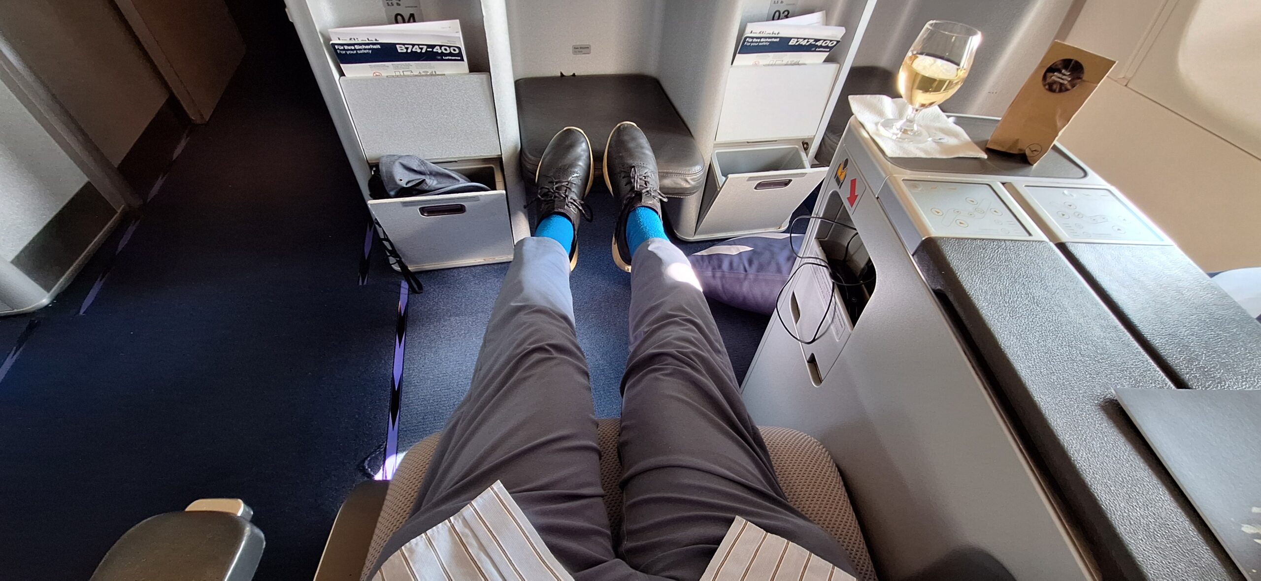 a person's legs in a chair