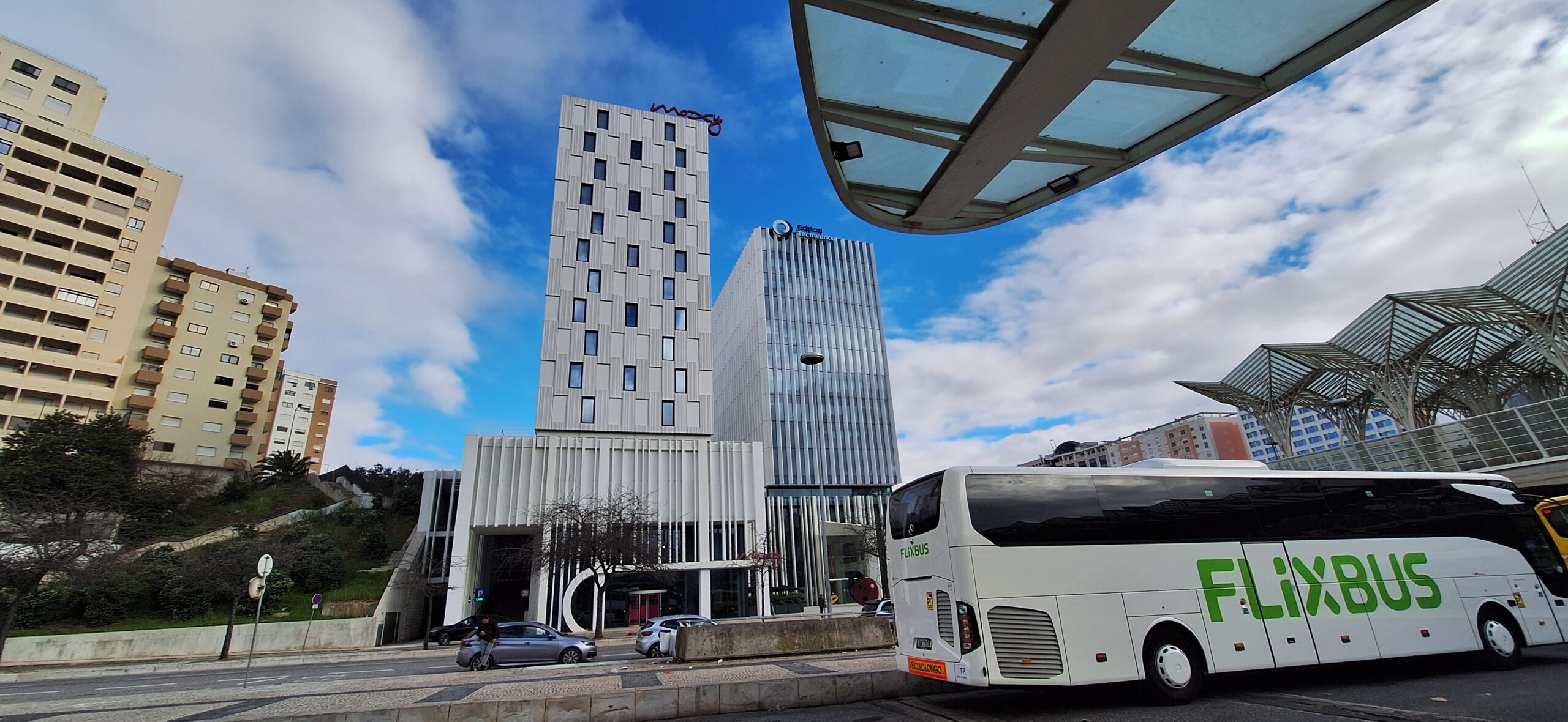a bus driving down a street