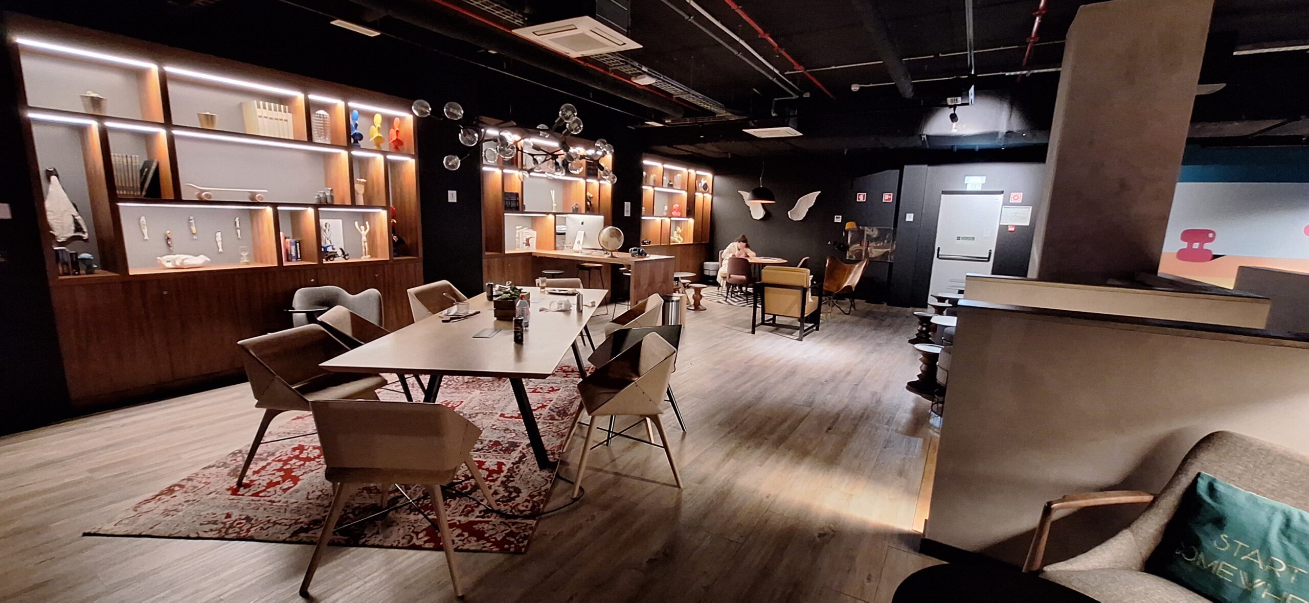 a room with a table and chairs