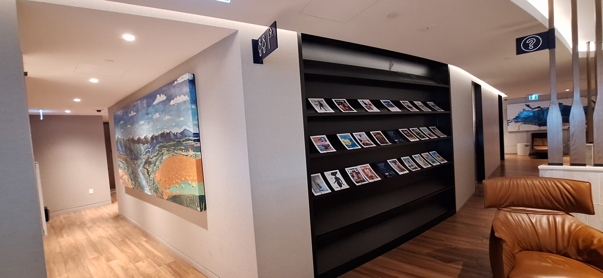 a shelf with pictures on it