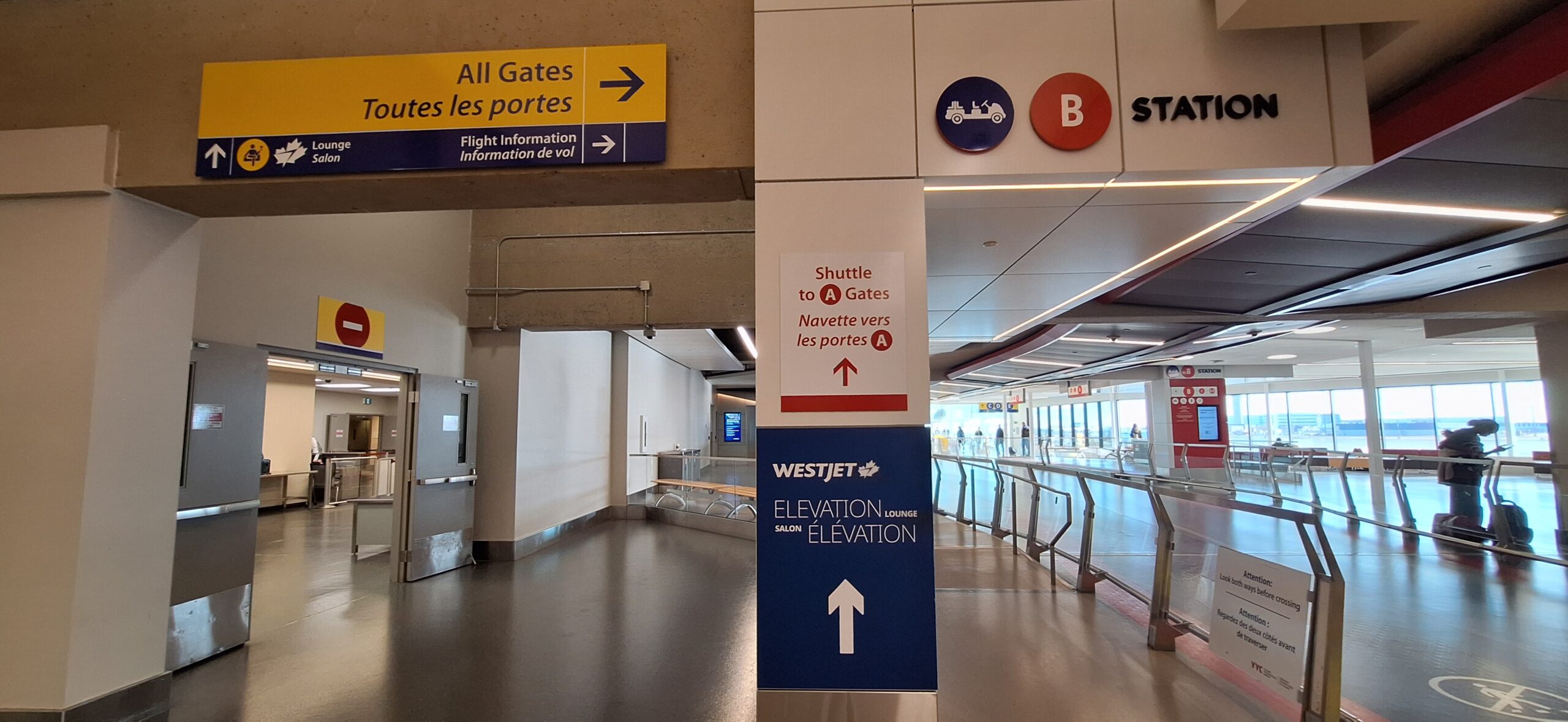 signs on a wall in a building