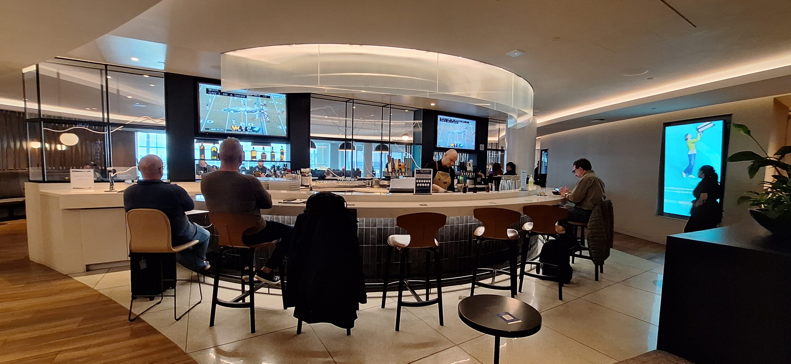 people sitting at a bar