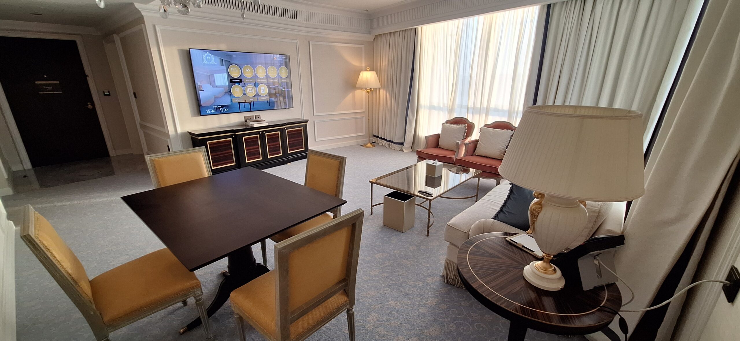 a room with a television and a table