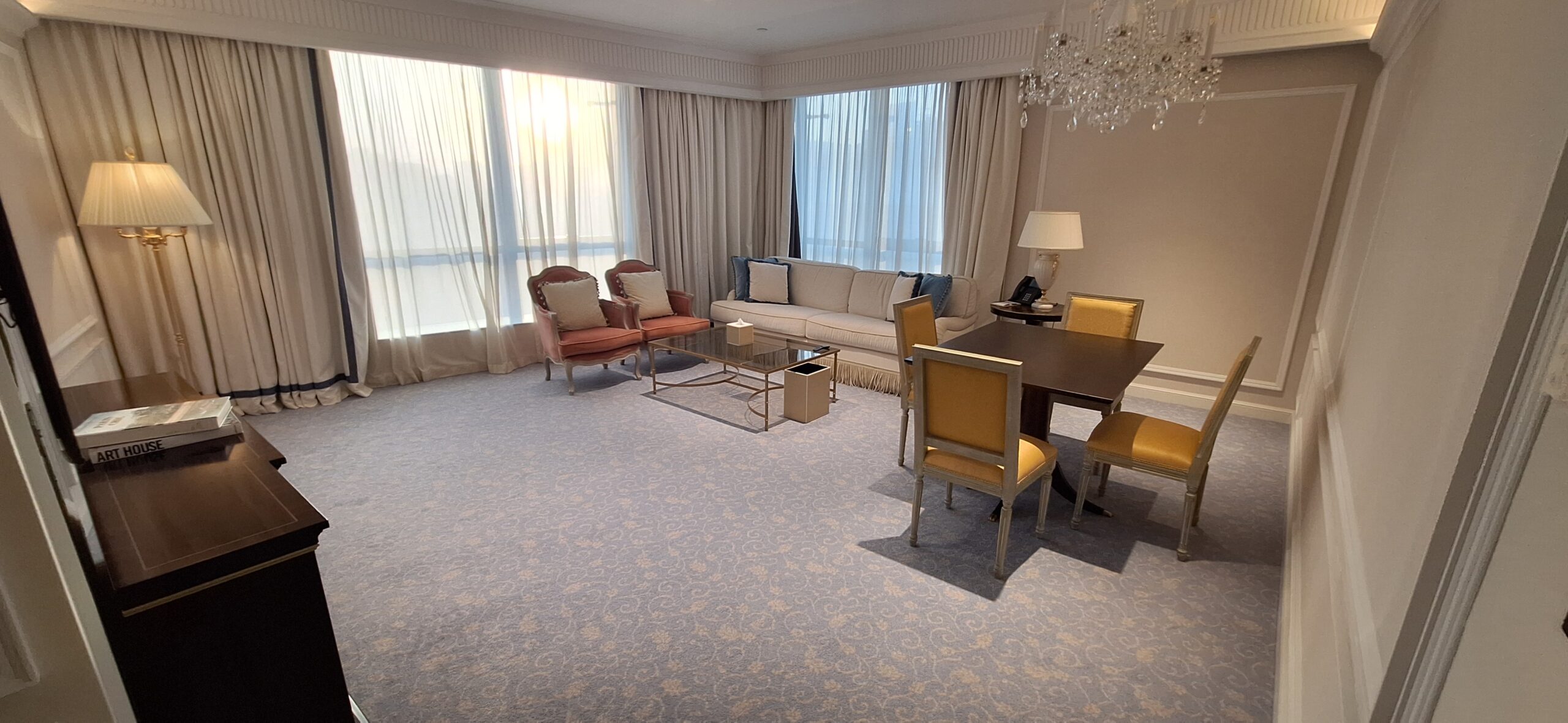 a room with a table and chairs