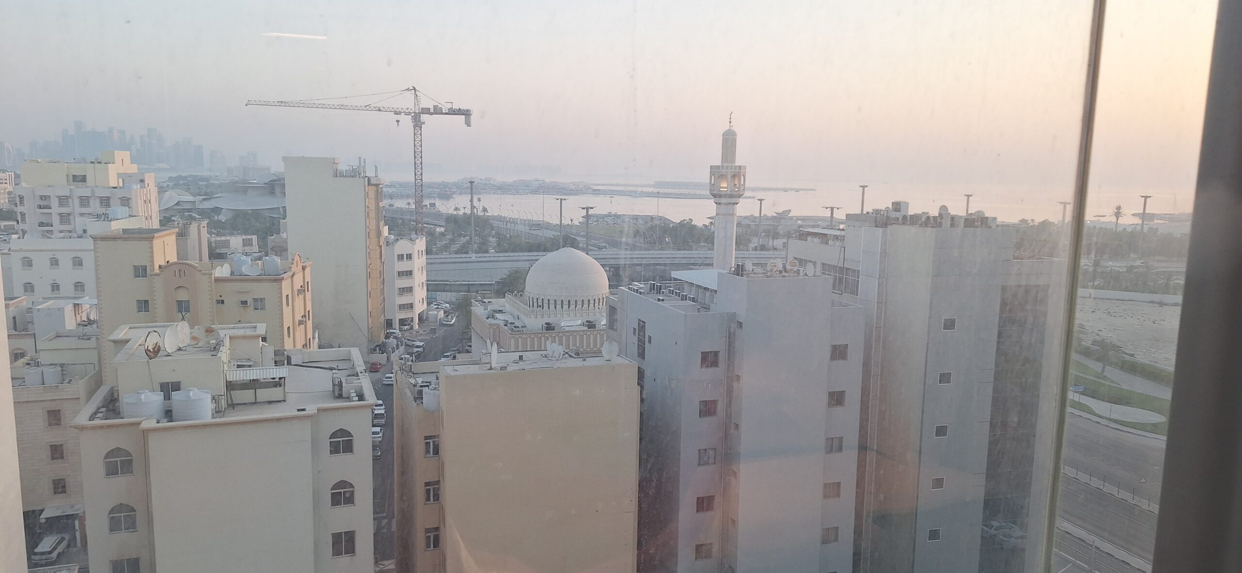 a tall buildings with a dome on top