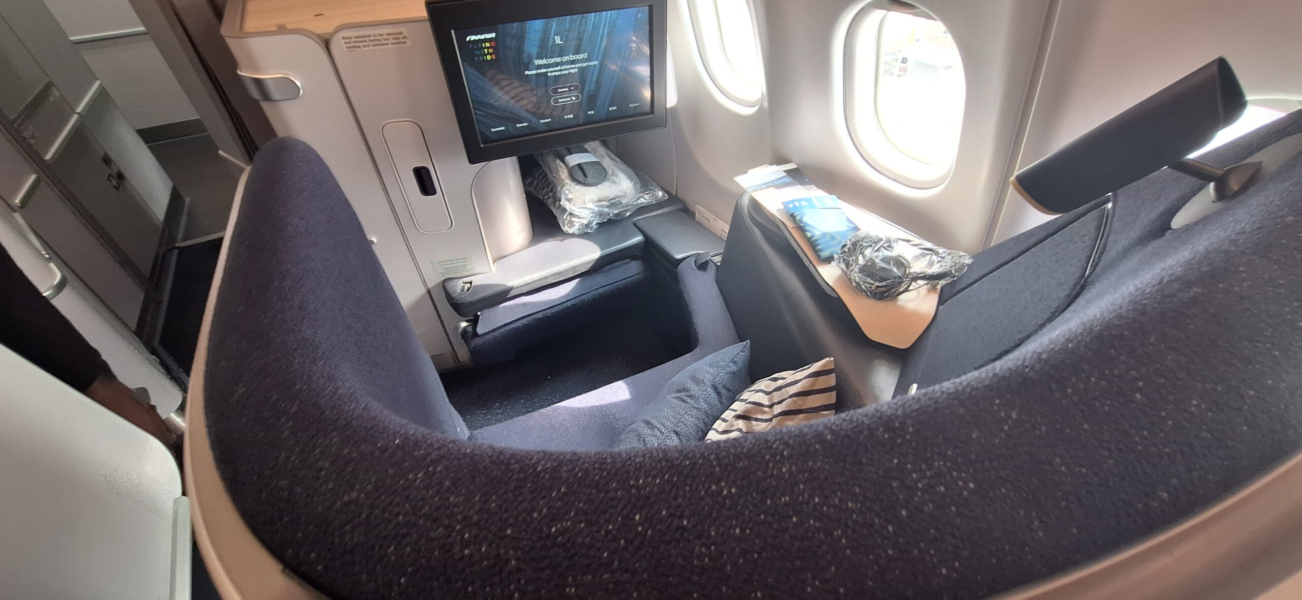 a tv on the side of an airplane