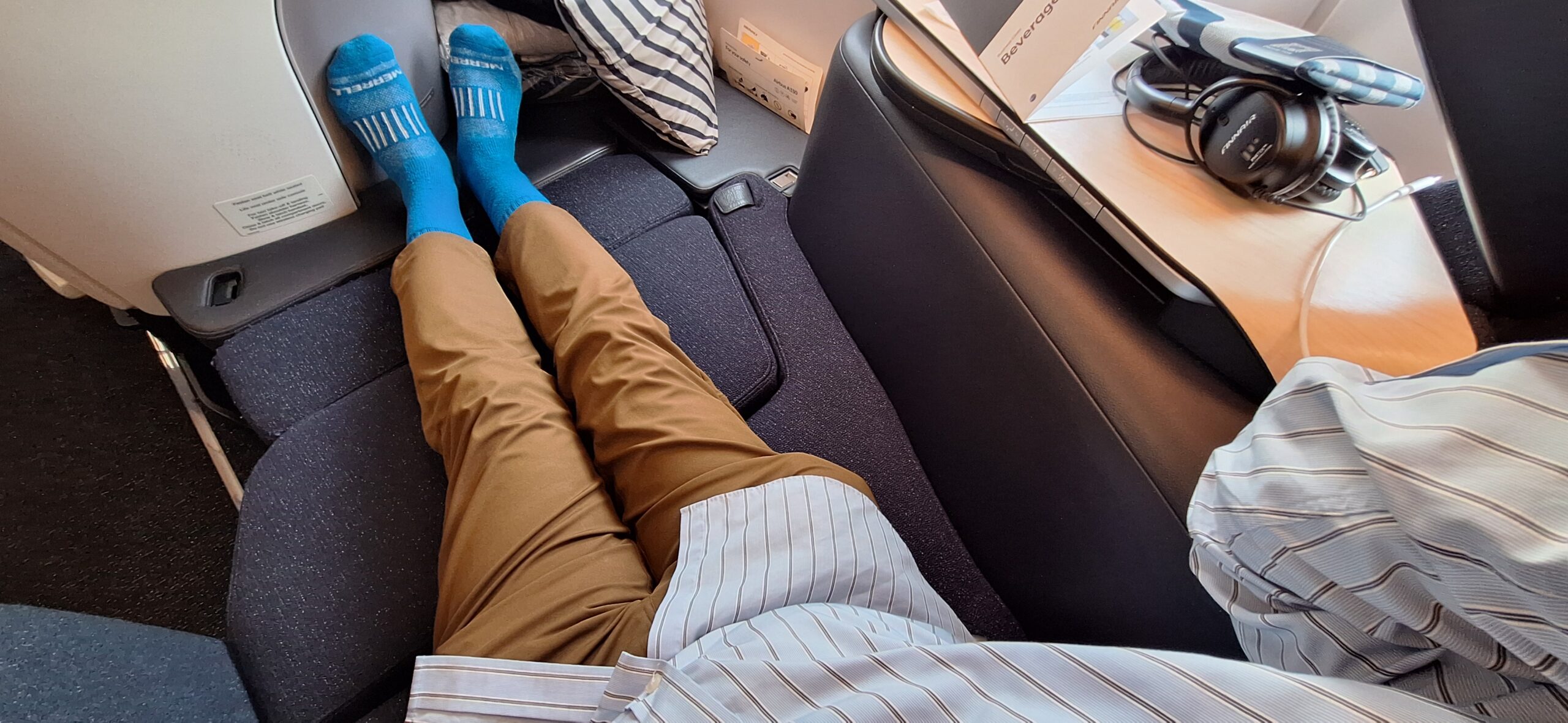 a person's legs in a chair