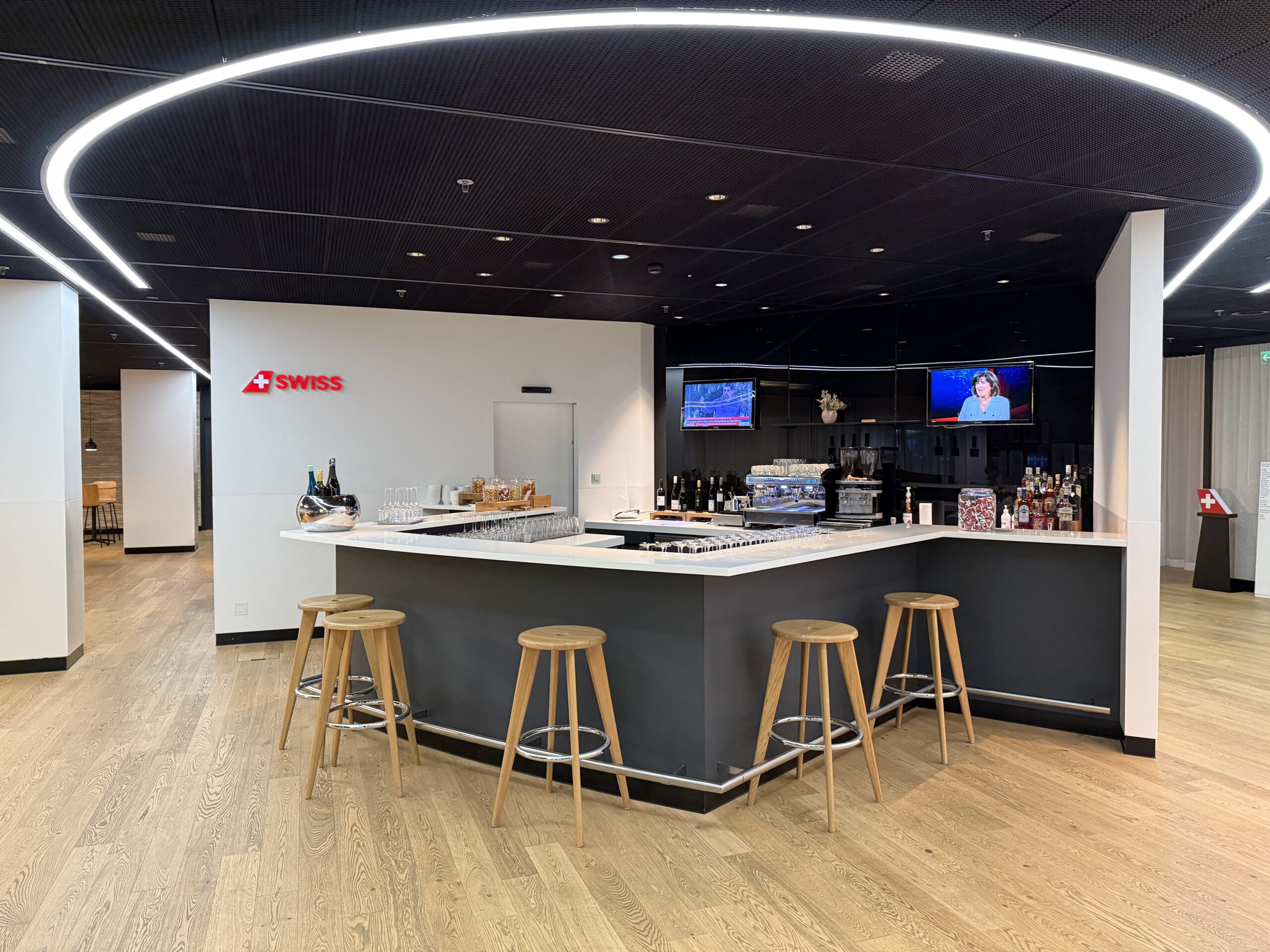 a bar with a counter and stools