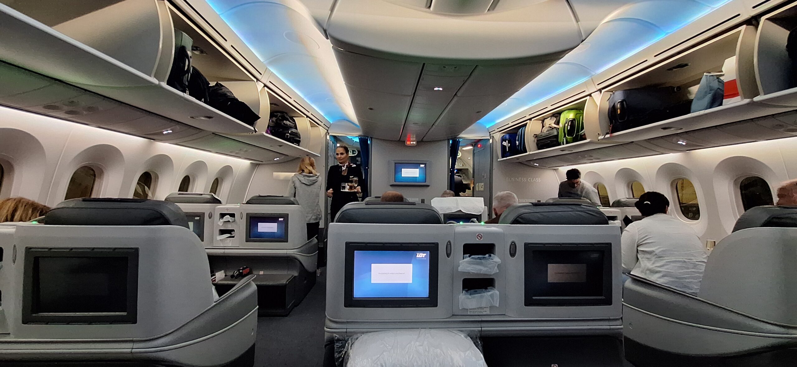 a person standing in the back of a plane