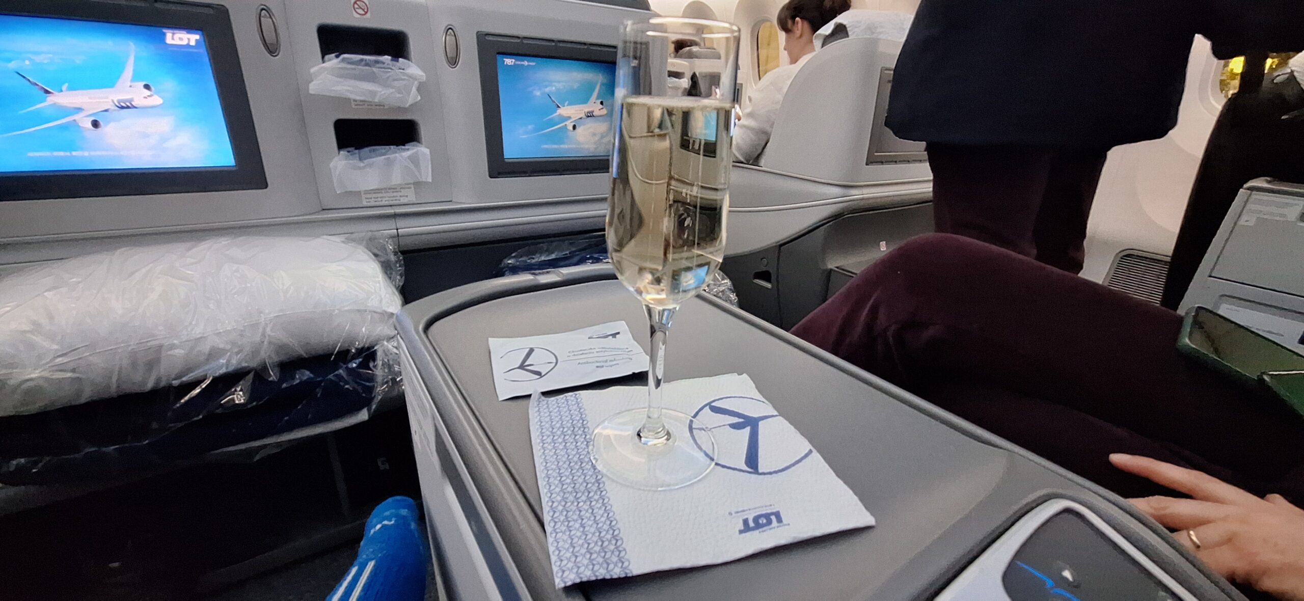 a glass of champagne on a tray