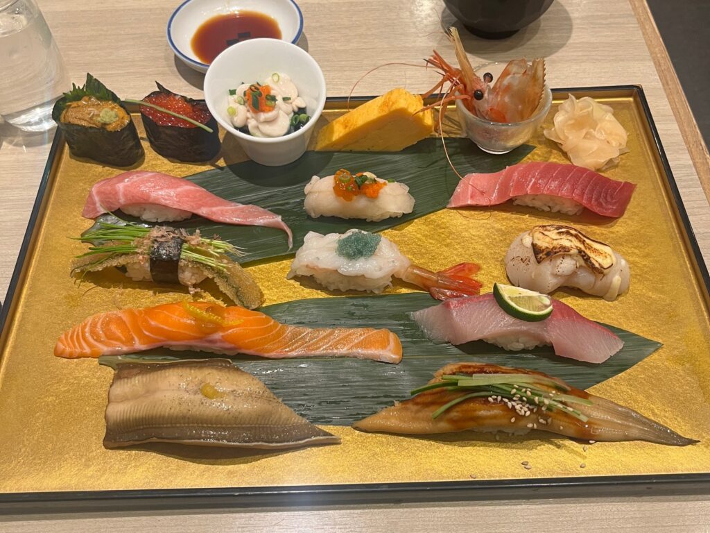 a plate of sushi with different types of sushi