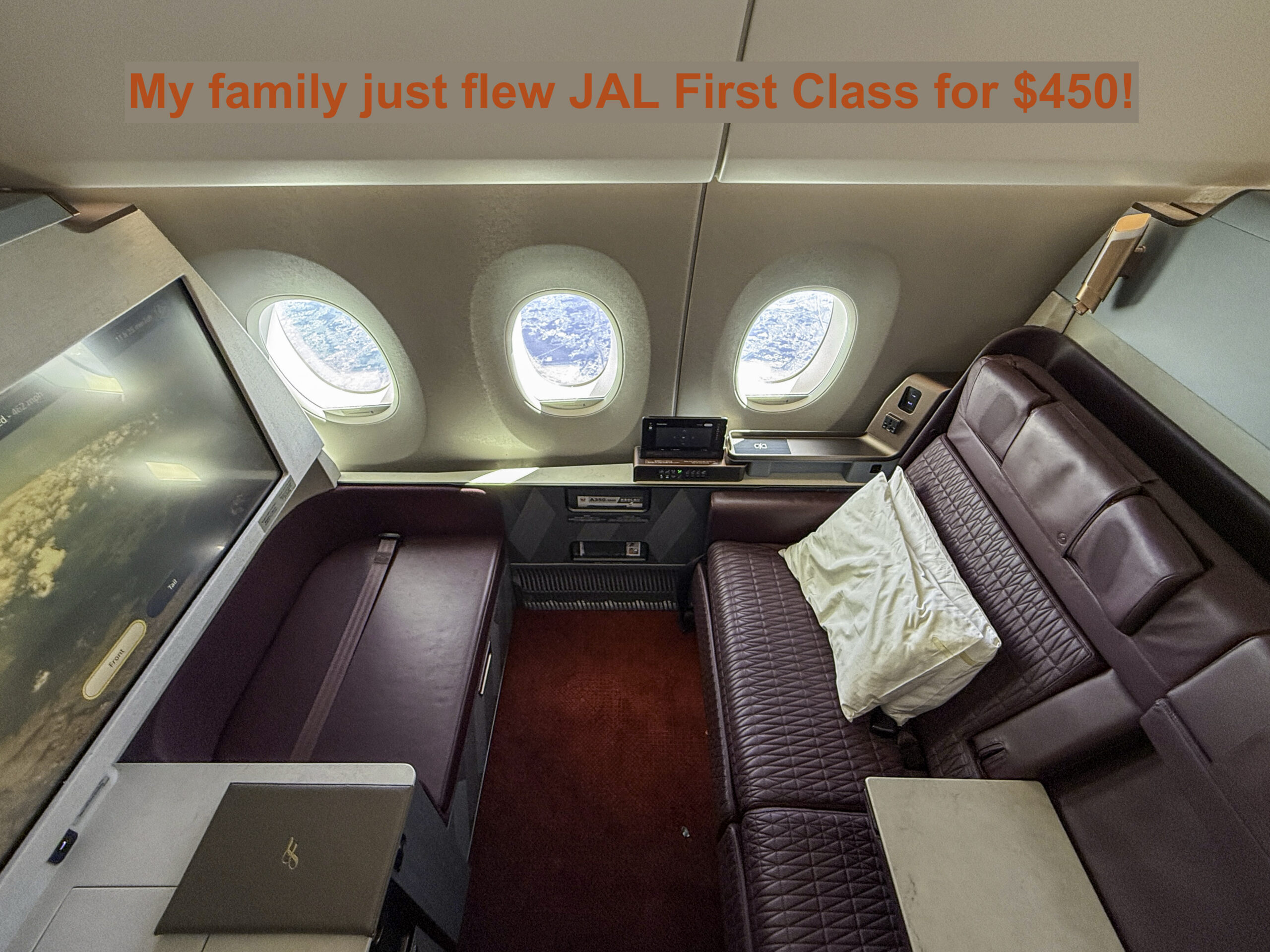 a room with a couch and a television