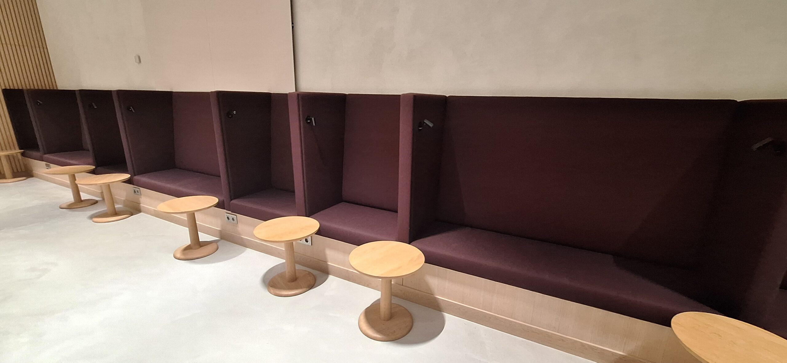 Finnair Business Class Lounge a row of chairs and tables