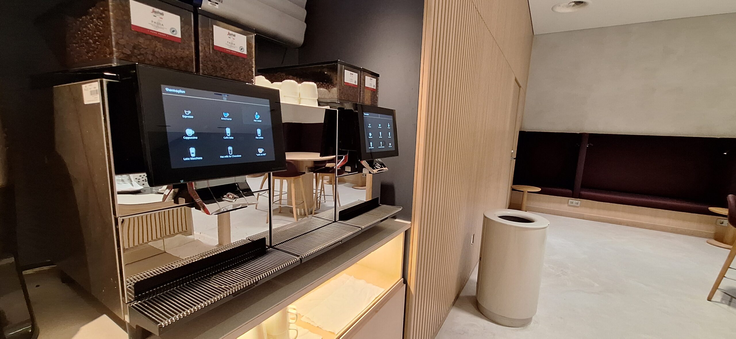 Finnair Business Class Lounge a computer screens on a counter