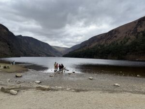 a group of people standing in a lake