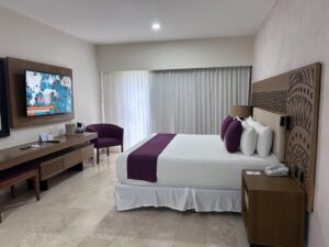 Review Viva Azteca Resort Mexico a room with a bed and a television
