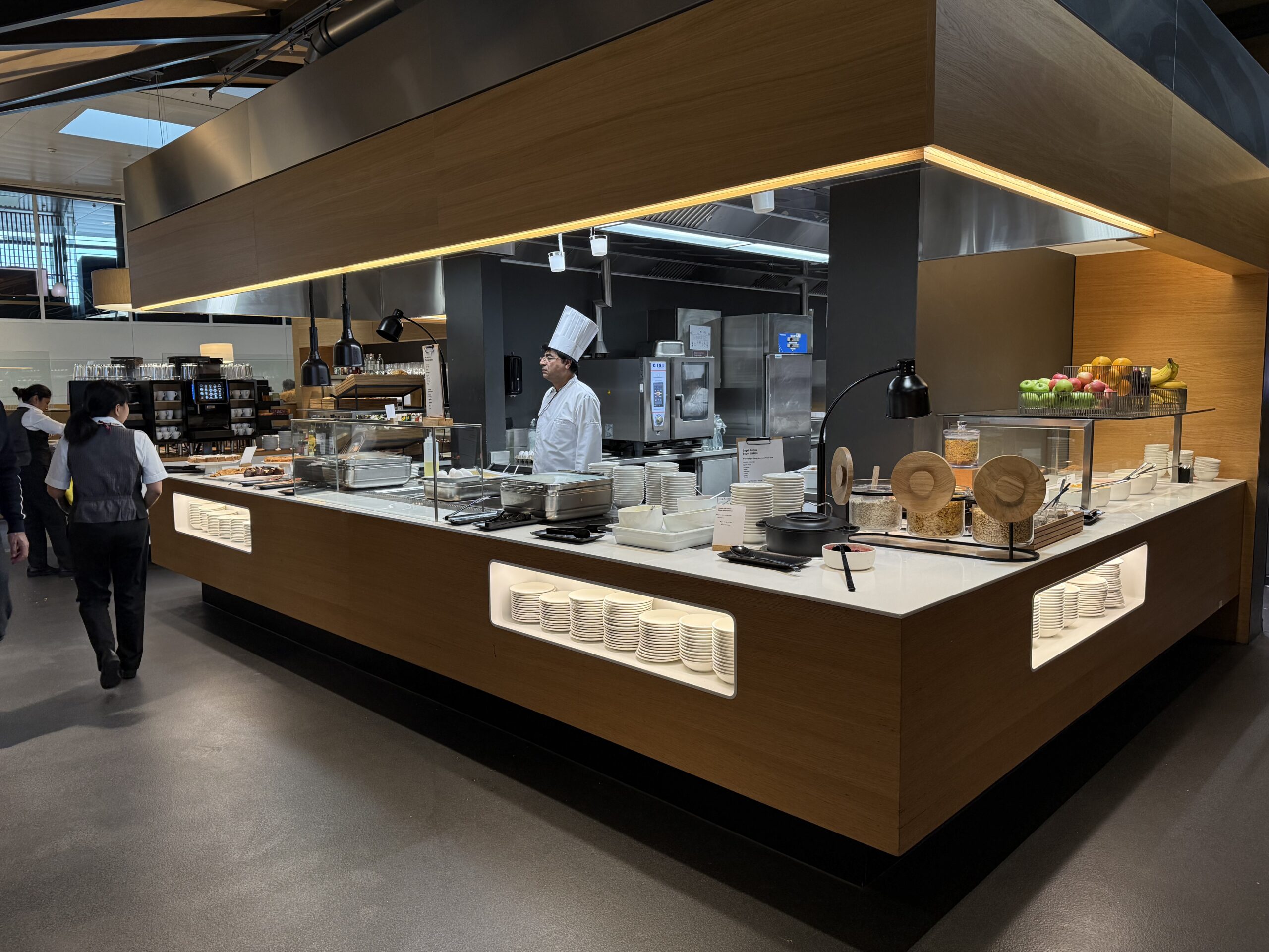 Swiss Senator Lounge Zurich Terminal A Review a chef in a kitchen