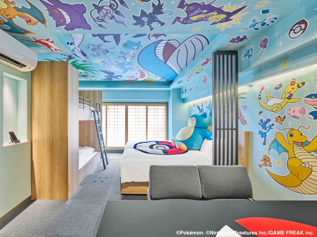 a room with a bed and a bed with a bed and a bunk bed