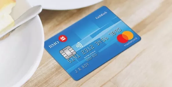 a blue credit card on a table