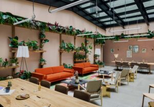 a room with a large table and chairs