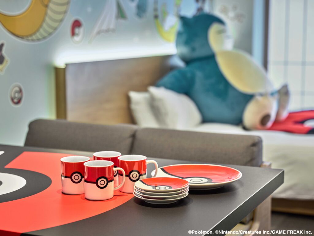 a table with a group of mugs and plates