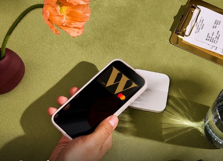 a hand holding a phone