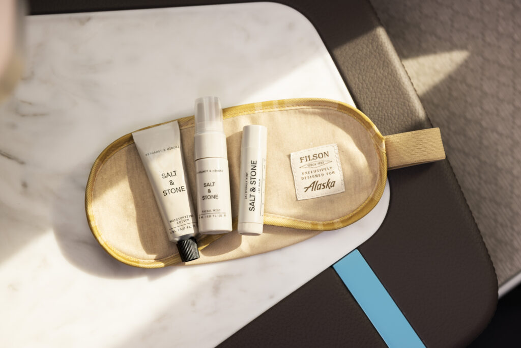 a group of small white bottles on a brown object