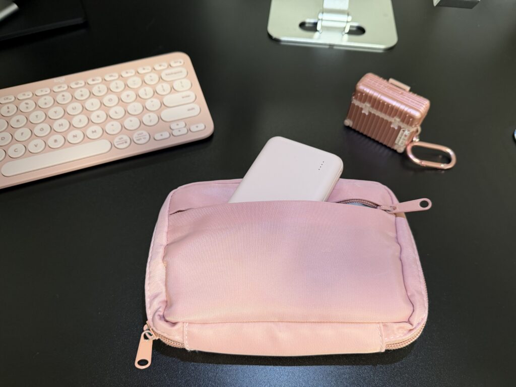PMB Team's Must-Have Travel Products a pink pouch with a white device in it