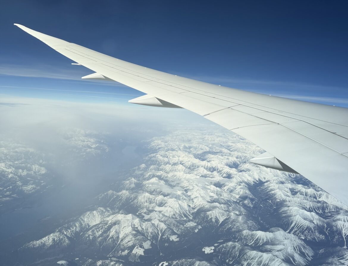 an airplane wing in the air