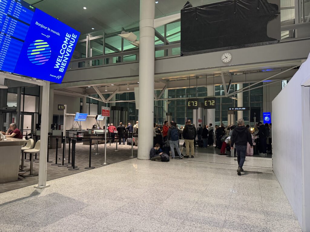 a group of people in an airport
