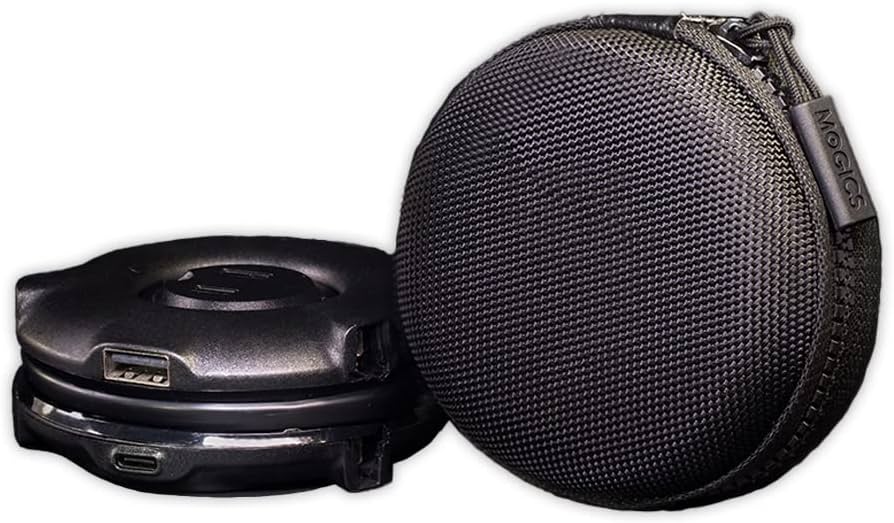 PMB Team's Must-Have Travel Products a black round object with a black strap